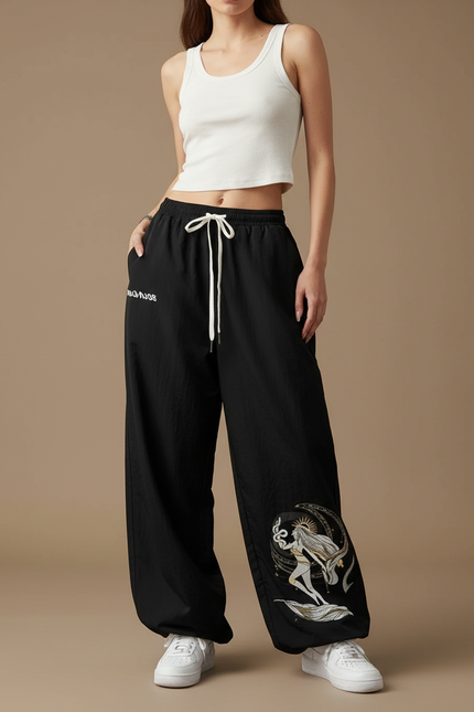Pantalon Parachute Noir Ample Motif Mythologique Cordon - Polyester