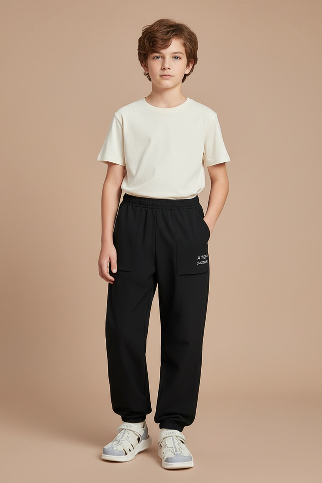 Pantalon Parachute Noir Ample Sport Enfant Respirant - Polyester